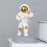 Spice Up Your Desk with this Astronaut-Themed Phone Holder - Perfect for Office Decor!